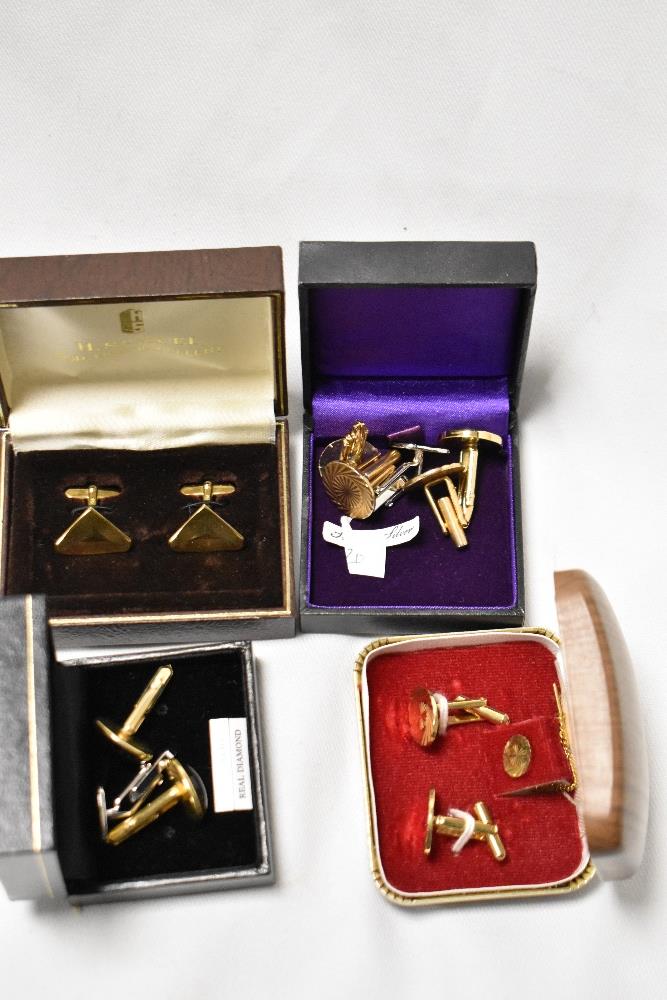 Four cased pairs of gold coloured cufflinks and others, of different styles