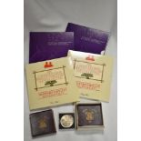 A collection of collectable and uncirculated coins, including two Queen Elizabeth eightieth birthday