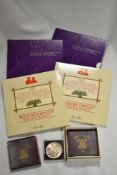 A collection of collectable and uncirculated coins, including two Queen Elizabeth eightieth birthday