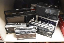 An assortment of retro radios, including Grundig, Morphy Richards and Cima.