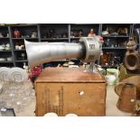 A vintage mountable loud speaker with wooden crate.