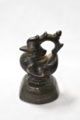 An Eastern cast bronze crested duck paperweight, measuring 9cm tall