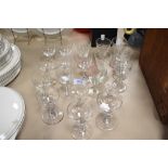 Nineteen vintage and antique wine glasses, including cut glass examples and Victorian glasses with