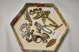 A box of white metal, to include brooches, a George V coin mounted ring, a Birmingham silver