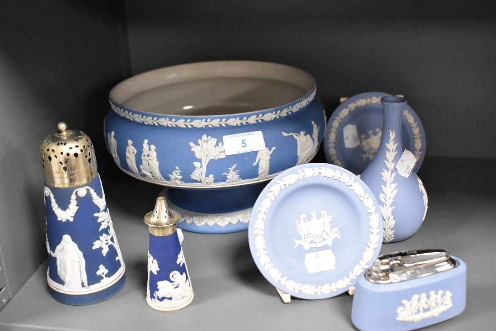 An assorted collection of blue jasperware, to comprise a footed fruit bowl, two circular pin dishes,