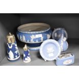 An assorted collection of blue jasperware, to comprise a footed fruit bowl, two circular pin dishes,