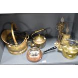 A small brass coal helmet with swing over handle, sold along with two brass kettles, copper pan