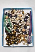 A box of mixed contemporary bead jewellery and a wristwatch