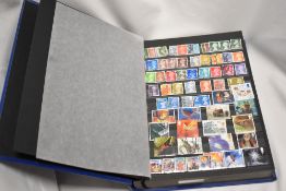 A partially filled stamp stamp album of mixed interest, including Denmark, India and England.