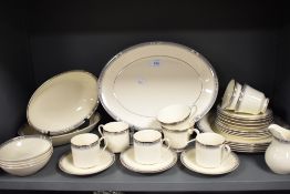 A selection of Royal Doulton 'Melissa' table ware, cups, saucers, platter and serving bowls