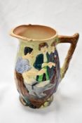A Burleigh Ware 'The Runaway Marriage' by The Blacksmith of Gretna Green relief moulded jug, with