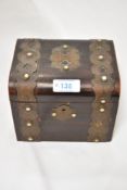 A Victorian brass bound simulated rosewood tea caddy, the brass mounts with mother-of-pearl