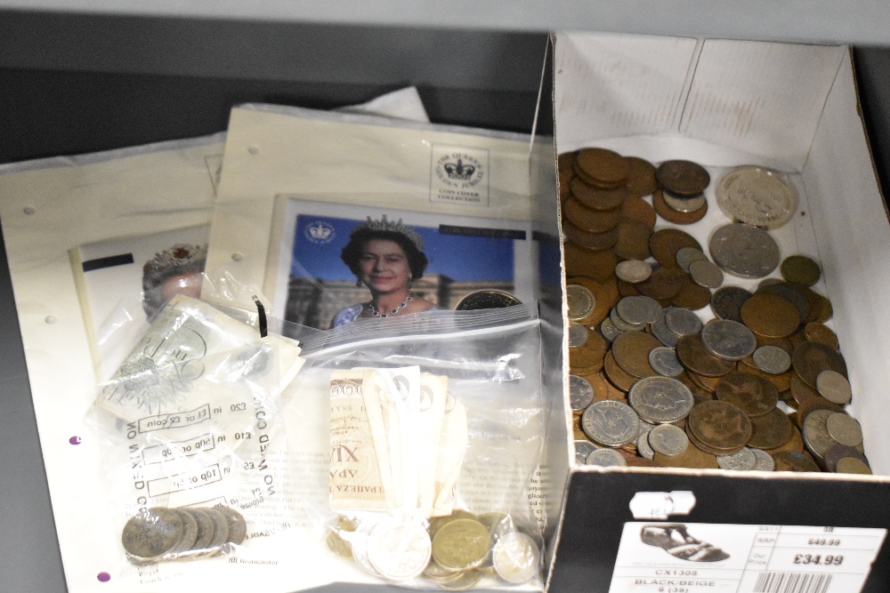 An assortment of collectable coins, including some early 20th century British coins, some foreign