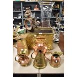 An early 20th century copper coach lamp, an a selection of mid century brass and copper wares,