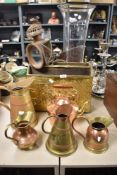 An early 20th century copper coach lamp, an a selection of mid century brass and copper wares,