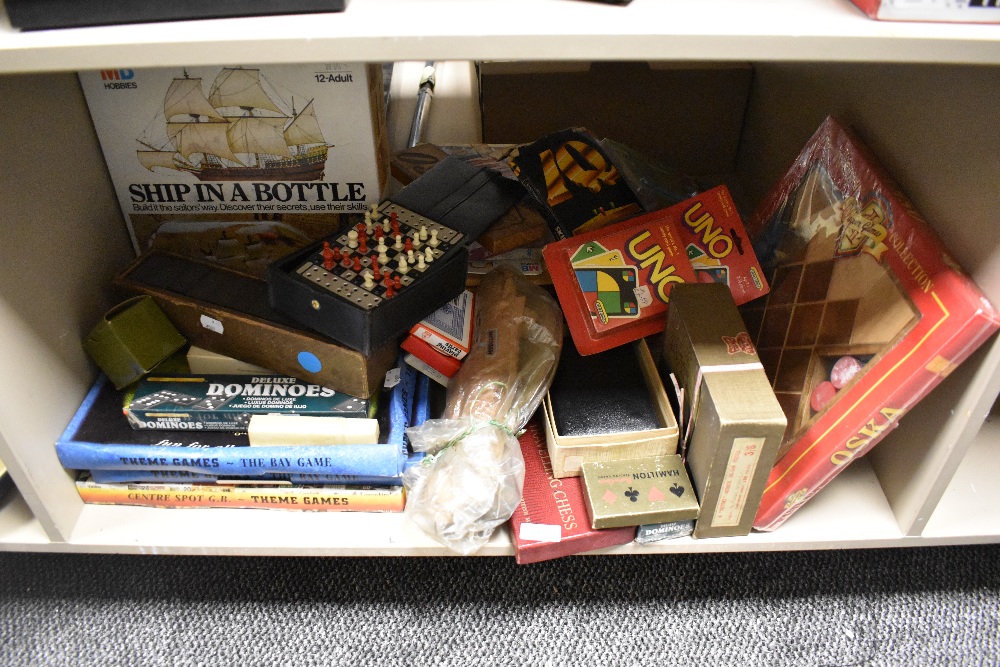 An assortment of vintage and retro board games etc, including travelling chess, A Victory jigsaw,