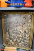 An interesting embossed Cordoban leather panel, displayed within an ornate gilt wood frame, 65cm x