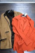 A gentleman's quilted Orvis jacket, with faux fur lining, XL, and a Filson of Seattle burnt orange