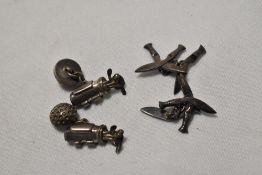 Two pairs of cufflinks, to comprise a pair of silver golf inspired cufflinks and white metal Kukri