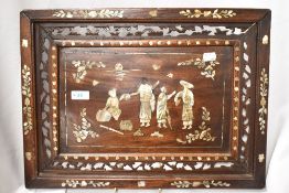 An Eastern/Chinese carved pierced and Mother-of-Pearl inlaid tray, decorated with figures and