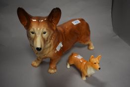 A large Melba ware Corgi study and a smaller Sylvac example.