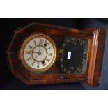 An early 20th century American mahogany cased wall clock, having painted detailing to glass door,