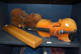 Two vintage violins one stamped HOPF being a basic shell with some previous worm damage and the