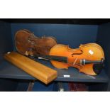 Two vintage violins one stamped HOPF being a basic shell with some previous worm damage and the