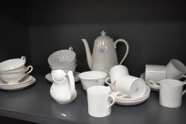 A selection of Spode table wares, having plain white ground, tea pot, coffee cans, tea cups and