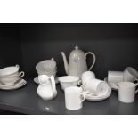 A selection of Spode table wares, having plain white ground, tea pot, coffee cans, tea cups and