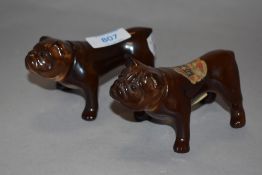 Two vintage ceramic decanters, in the form of Bulldogs, one having original paper label.
