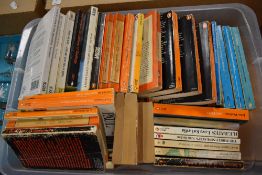 A box of mixed novels and reference books, including Penguin classics and Penguin books of Geography