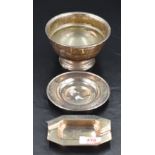 A Queen Elizabeth II silver ashtray, of canted rectangular form with moulded 'rests' the dished