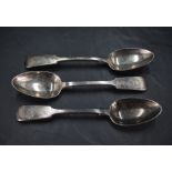 A group of three Victorian silver spoons, fiddle pattern with engraved foliate cartouche and initial