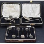 A cased George V silver feeding spoon and pusher set, marks for Birmingham 1929, maker Arthur