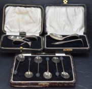 A cased George V silver feeding spoon and pusher set, marks for Birmingham 1929, maker Arthur
