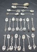 A selection of Continental white metal novelty coffee spoons, each with decorative handle