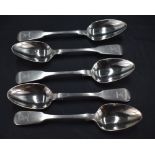 A group of five George IV silver fiddle pattern desert spoons, engraved stags head crest to