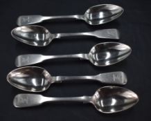 A group of five George IV silver fiddle pattern desert spoons, engraved stags head crest to
