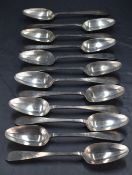 A set of twelve George V silver dessert spoons, Old English pattern pointed variant, engraved with