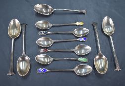 A group of six 1930's silver and enamel coffee spoons, the terminals engine-turned and guilloche