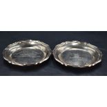 A pair of Queen Elizabeth II silver pin dishes, of circular form with moulded 'Chippendale' design