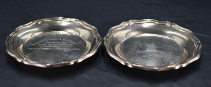 A pair of Queen Elizabeth II silver pin dishes, of circular form with moulded 'Chippendale' design