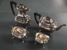 A George V silver four-piece silver teaset, comprising hotwater pot, teapot, sugar and cream, of