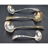A pair of George III silver sauce ladles, Old English pattern with engraved initial H and arm and