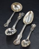 A group of four Victorian silver Albert pattern spoons, comprising two table spoons, dessert spoon