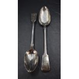 A pair of early Victorian silver fiddle pattern serving spoons, each with engraved initial 'B' and