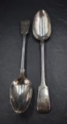 A pair of early Victorian silver fiddle pattern serving spoons, each with engraved initial 'B' and