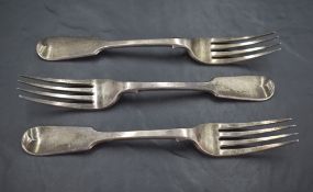 A group of three Victorian silver forks, fiddle pattern with engraved foliate cartouche and