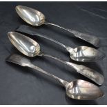 A group of three early 19th century Irish silver table spoons, fiddle pattern with engraved initials